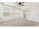 Spacious bedroom with carpet, ample lighting, and built in shelving at 4915 Chidlaw Ave # 2, Las Vegas, NV 89115