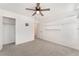 Well-lit carpeted bedroom offering plenty of space and built in shelving at 4915 Chidlaw Ave # 2, Las Vegas, NV 89115
