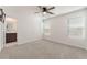 Spacious bedroom with plush carpet, ceiling fan and bright natural light at 4915 Chidlaw Ave # 2, Las Vegas, NV 89115