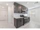 Modern kitchen equipped with stainless steel appliances, white countertops, and ample cabinet space at 4915 Chidlaw Ave # 2, Las Vegas, NV 89115