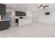 Bright kitchen with white countertop island and gray cabinets, and tile floors at 4915 Chidlaw Ave # 2, Las Vegas, NV 89115