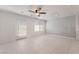 Bright and open living area with a ceiling fan and access to the outdoors at 4915 Chidlaw Ave # 2, Las Vegas, NV 89115
