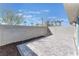 The backyard patio with privacy wall is ready for your next barbecue at 4915 Chidlaw Ave # 2, Las Vegas, NV 89115