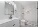 Modern bathroom featuring white vanity, stylish fixtures, and a luxurious tile shower at 4980 Becky Pl, Las Vegas, NV 89120
