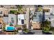 This property has a lush green yard and is situated among mature trees and other homes at 5065 Atherton St, Las Vegas, NV 89120