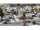 Home boasts a well-maintained yard, mature trees, and convenient street access at 5065 Atherton St, Las Vegas, NV 89120