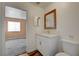 Bathroom with a white vanity, quartz countertop, and a view into the carpeted bedroom at 5065 Atherton St, Las Vegas, NV 89120