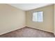 Bedroom with a neutral color scheme, carpet and a window with blinds at 5065 Atherton St, Las Vegas, NV 89120