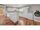 Well-lit kitchen with white cabinets, stainless steel appliances, and a center island at 5065 Atherton St, Las Vegas, NV 89120