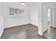 Finished basement featuring wood-look floors and a window at 5376 Hillsboro Ln, Las Vegas, NV 89120