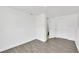 Finished basement featuring wood-look floors, wainscoting, and closet space at 5376 Hillsboro Ln, Las Vegas, NV 89120