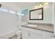 Bathroom with a shower-tub combination and granite countertops at 5376 Hillsboro Ln, Las Vegas, NV 89120