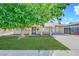 Lovely single-story home with a green lawn at 5376 Hillsboro Ln, Las Vegas, NV 89120