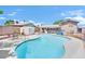 Relaxing in-ground pool and patio area, ideal for swimming and outdoor enjoyment in the backyard at 5376 Hillsboro Ln, Las Vegas, NV 89120