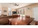 Open dining room features wooden table with chairs, recessed lighting and views to back patio at 5932 Lamotte Ave, Las Vegas, NV 89141