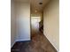 Hallway with tile flooring leading into a spacious living area at 6093 Crown Palms Ave, Las Vegas, NV 89139