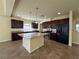 Kitchen with stainless steel appliances, granite countertops, and a center island at 6093 Crown Palms Ave, Las Vegas, NV 89139