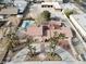 Aerial view showing an estate with a pool, palm trees, and a spacious lot at 6130 Tara Ave, Las Vegas, NV 89146