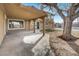 Backyard showcasing a covered patio, mature landscaping, and access to the swimming pool at 6130 Tara Ave, Las Vegas, NV 89146
