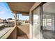 A large balcony offers views of the pool and surrounding area and provides access to the living room at 6130 Tara Ave, Las Vegas, NV 89146