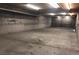 Large, unfinished basement with concrete floor, cinder block walls, and overhead lighting ready to be transformed at 6130 Tara Ave, Las Vegas, NV 89146