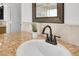 Close up of bathroom featuring a granite countertop, undermount sink, and bronze faucet at 6130 Tara Ave, Las Vegas, NV 89146