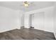 A bedroom with hardwood floors and a closet at 6130 Tara Ave, Las Vegas, NV 89146