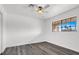 Bedroom featuring hardwood floors, a ceiling fan and window at 6130 Tara Ave, Las Vegas, NV 89146