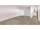 Bright bedroom features a neutral color palette, plush carpeting, and a spacious walk-in closet at 6130 Tara Ave, Las Vegas, NV 89146