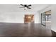 Spacious living room with hardwood floors offers an open floor plan and easy access to other areas of the home at 6130 Tara Ave, Las Vegas, NV 89146