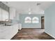 Inviting living room with modern wood floors, crisp white trim, and abundant natural light at 6130 Tara Ave, Las Vegas, NV 89146