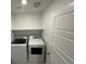 Laundry room with modern washer and dryer at 6139 Rathbone St, Las Vegas, NV 89166