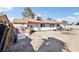 Backyard featuring an older roof and space for an empty lot at 6325 Miraloma St, Las Vegas, NV 89108