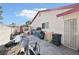 Backyard featuring a gated door, alley access, and wall for privacy at 6325 Miraloma St, Las Vegas, NV 89108