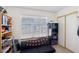 Modest bedroom with natural light and comfortable space at 6325 Miraloma St, Las Vegas, NV 89108