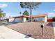 Lovely single-story home with a two-car garage and zero landscaping in a quiet neighborhood at 6325 Miraloma St, Las Vegas, NV 89108