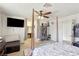 A spacious main bedroom offering plenty of closet space and a comfortable bed at 6325 Miraloma St, Las Vegas, NV 89108