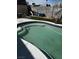 Inviting private pool featuring beautiful tile and stone coping at 6404 Penrose Ln, Las Vegas, NV 89107