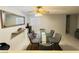 Dining room featuring a modern light fixture, large glass table and 6 chairs at 6750 Del Rey Ave # 133, Las Vegas, NV 89146