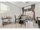 Cozy dining area with sliding door access to a fenced in backyard patio at 6957 Antequera St, Las Vegas, NV 89149