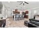 Open concept kitchen flows to the dining and living area with nice counter seating at 6957 Antequera St, Las Vegas, NV 89149