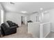 Spacious loft area with carpet flooring and natural light at 6957 Antequera St, Las Vegas, NV 89149