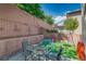 Spacious backyard with a patio, outdoor seating, and a play area perfect for Gathering activities at 7113 Forest Heights Ct, Las Vegas, NV 89166