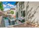 Charming backyard featuring a patio with comfortable seating and a built-in fire pit at 7113 Forest Heights Ct, Las Vegas, NV 89166