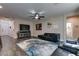 Cozy living room with dark wood floors, contemporary decor, and neutral wall colors at 7113 Forest Heights Ct, Las Vegas, NV 89166