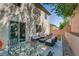 Inviting backyard patio with comfortable seating, stylish decor, and a serene outdoor atmosphere at 7113 Forest Heights Ct, Las Vegas, NV 89166