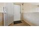 White front door with security screen and welcome mat offers a secure, inviting entrance to the home at 7200 Pirates Cove Rd # 2089, Las Vegas, NV 89145