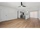 Bright, open living room with updated fixtures and adjacent eat-in kitchen at 728 Carpenter Dr, Las Vegas, NV 89107