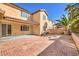 Expansive brick-paved backyard with ample space for entertaining and a well-maintained exterior at 7709 Tiny Tortoise St, Las Vegas, NV 89149