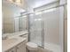 Bathroom with glass shower, and bright natural light at 7709 Tiny Tortoise St, Las Vegas, NV 89149